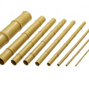 Natural long bamboo poles used to create elegant garden fencing and landscape borders