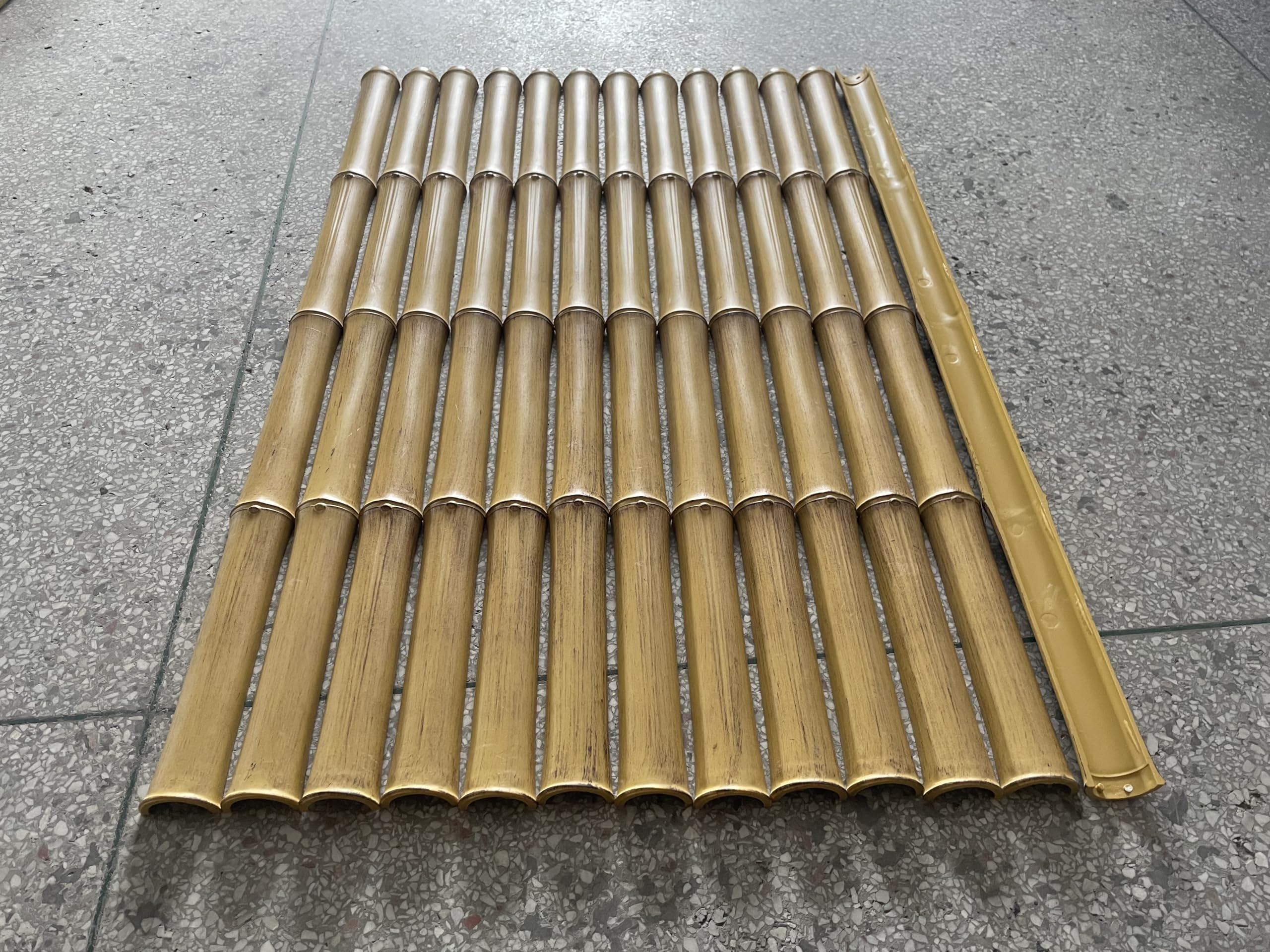 Set of faux half round bamboo trim pieces displayed with realistic bamboo color, nodes and curved profiles.